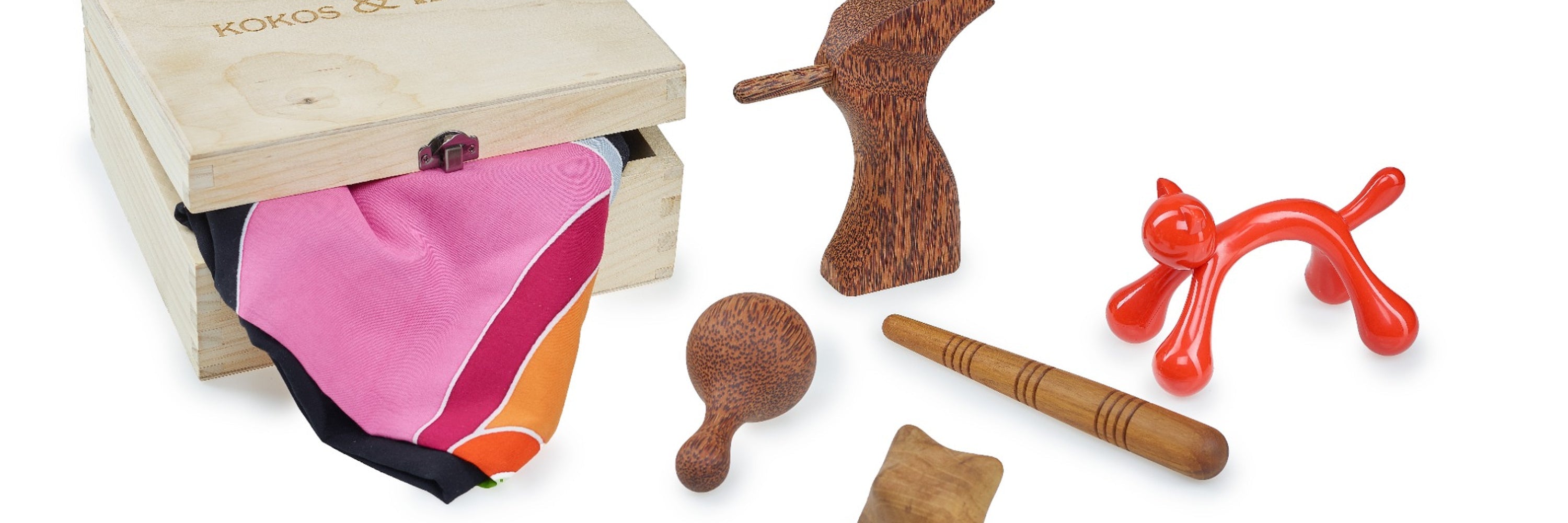 Massagezubehör Sortiment - Massagepistolen, Massagehölzer und Faszientools für Muskelarbeit und Entspannung